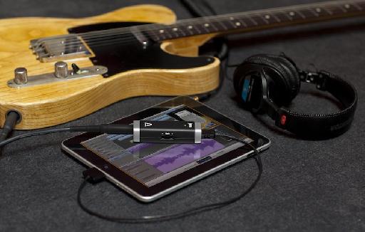 JAM connected to an iPad and a guitar.