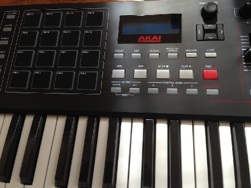 Transport buttons and display on the Akai Pro MPK 249.