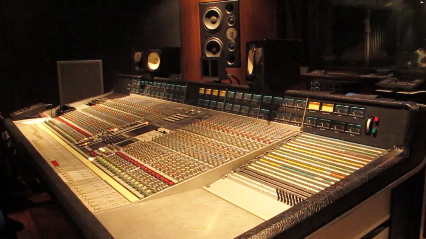 Fig 3: Pink Studios, Belgrade—Soffit mounted Dynaudio Pro M3 with Yamaha NS-10Ms on the bridge of an SSL 6000 E console.