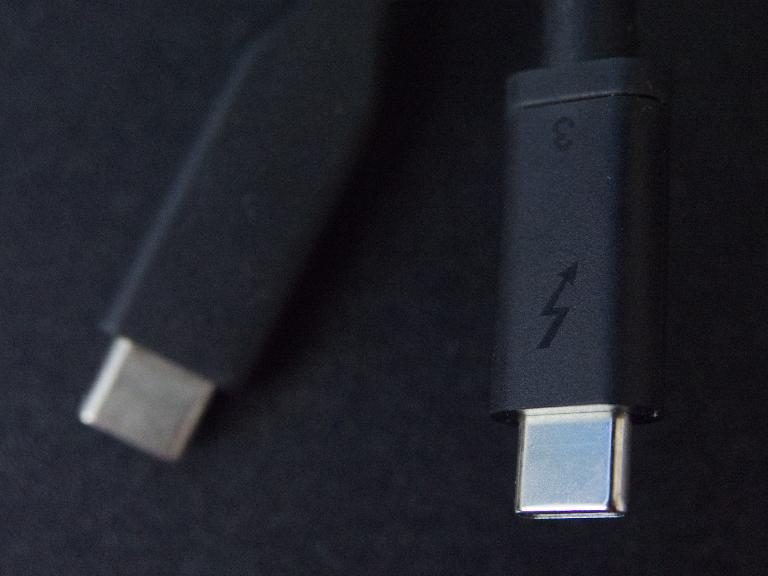 The cable on the left is USB 3.2 Gen 2, and the cable on the right is Thunderbolt 3 — obvious, right?