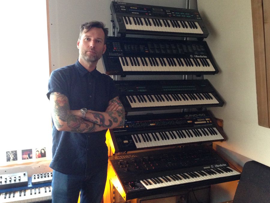 Next to the window is Liam's other stack of racked up synths.