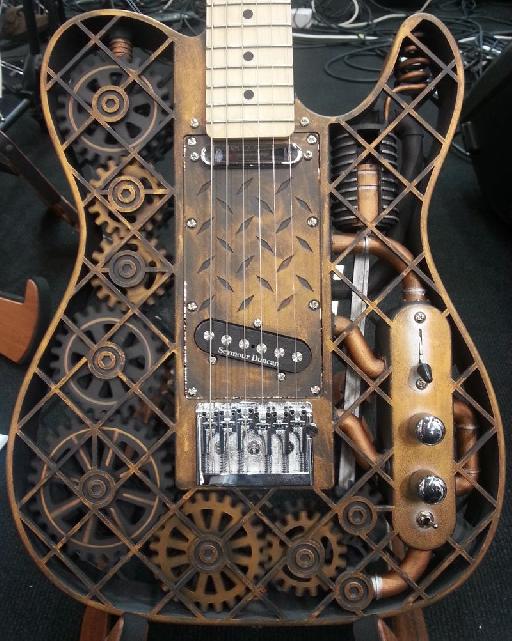 The Steampunk ODD guitar. Yes, the cogs and wheels inside rotate when being played... (see video below!)