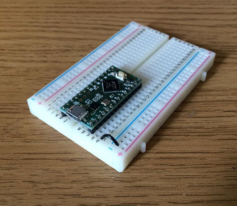A Teensy LC on a breadboard with the ground pin connected to the breadboards negative terminal 