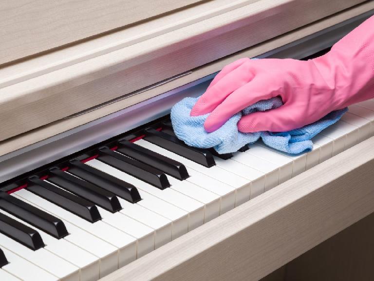 cleaning a piano