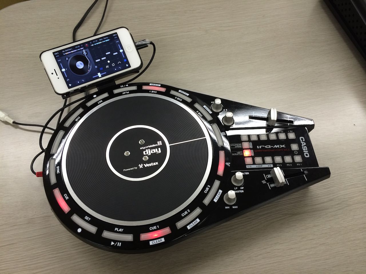 Casio Trackformer XW-DJ1 with iPhone attached.